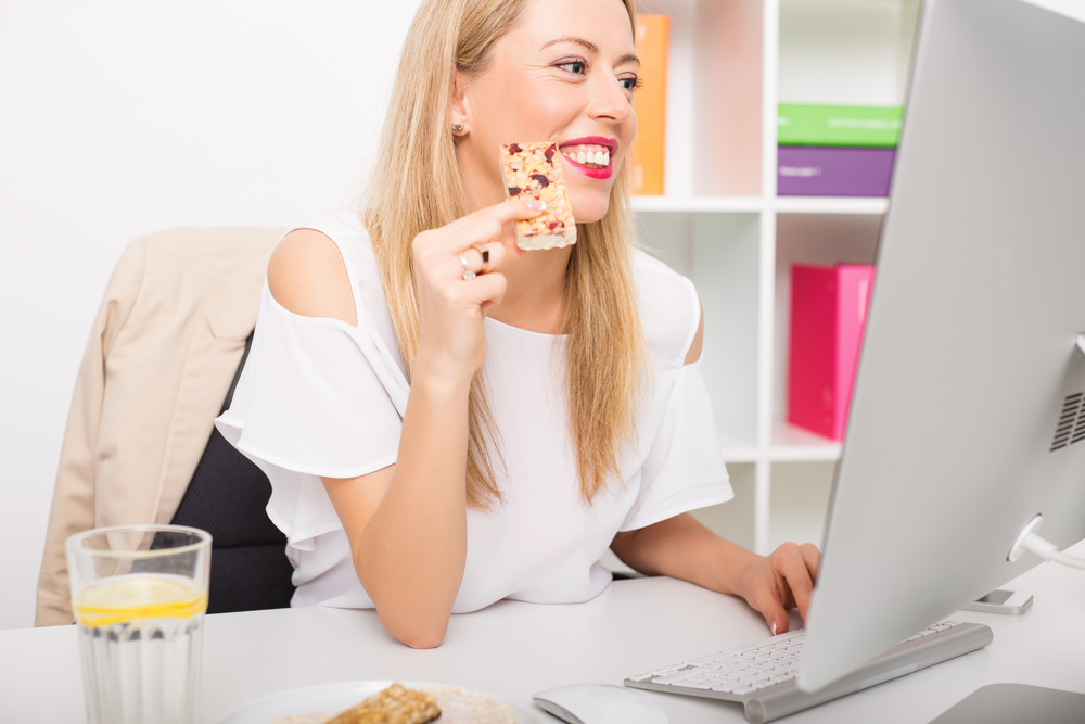 Woman enjoying office snack service